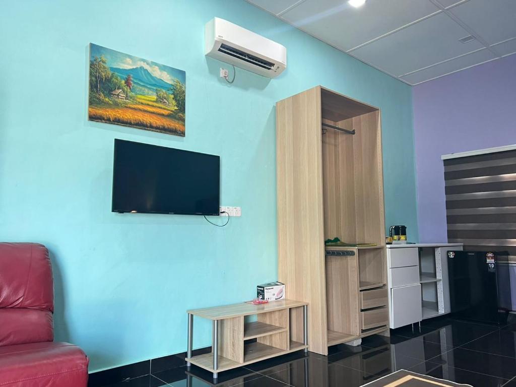 TV a/nebo společenská místnost v ubytování As Sufi Villa