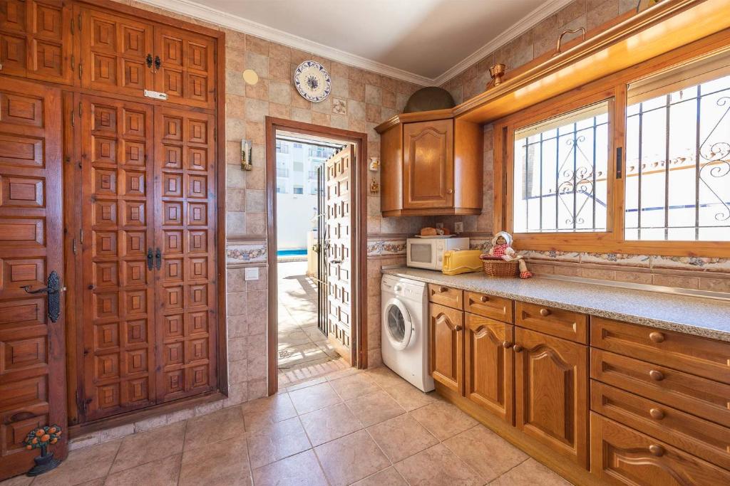 Kuchyňa alebo kuchynka v ubytovaní Villa de alquiler vacacional en Nerja Calle Solana