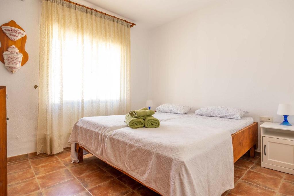 Posteľ alebo postele v izbe v ubytovaní Villa de alquiler vacacional en Nerja Calle Solana