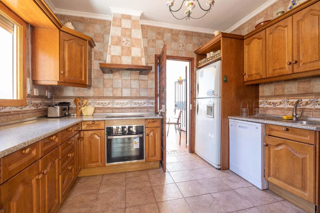 Kuchyňa alebo kuchynka v ubytovaní Villa de alquiler vacacional en Nerja Calle Solana