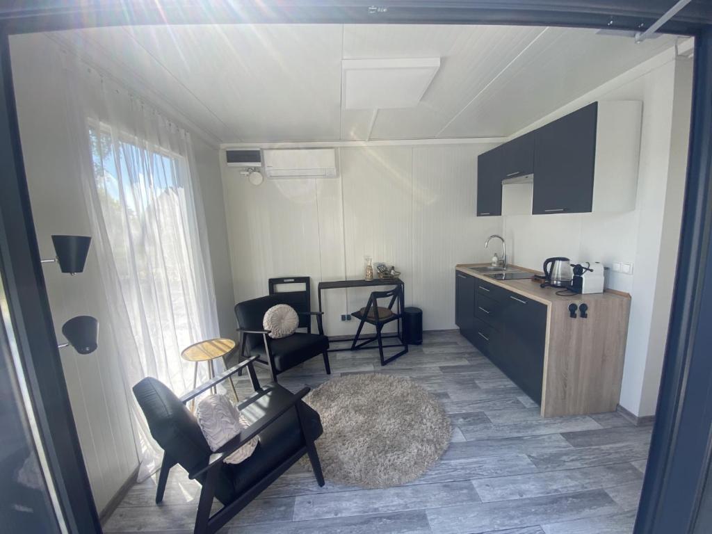 Kuchyň nebo kuchyňský kout v ubytování Tiny House QiriH