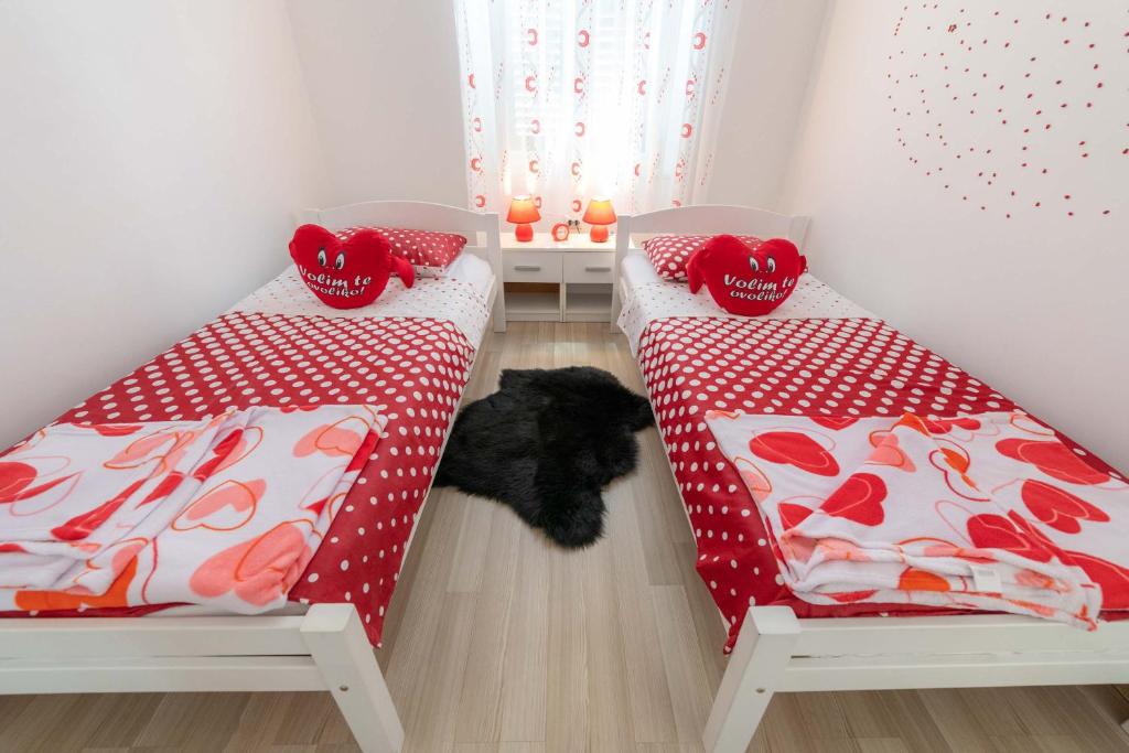 Posteľ alebo postele v izbe v ubytovaní Apartments Trend