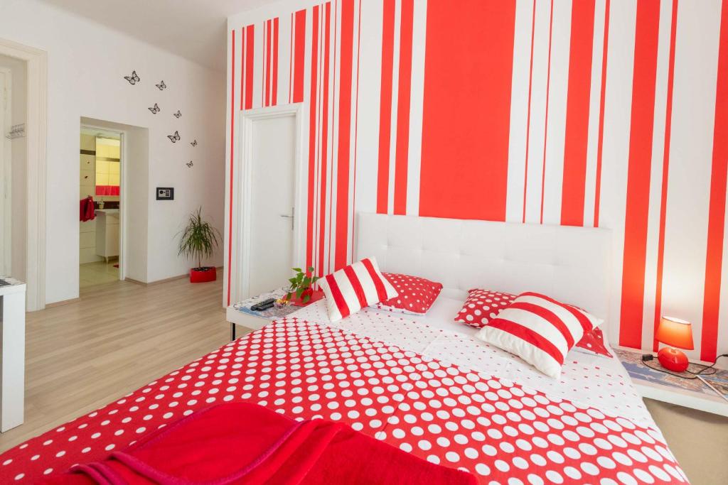 Posteľ alebo postele v izbe v ubytovaní Apartments Trend
