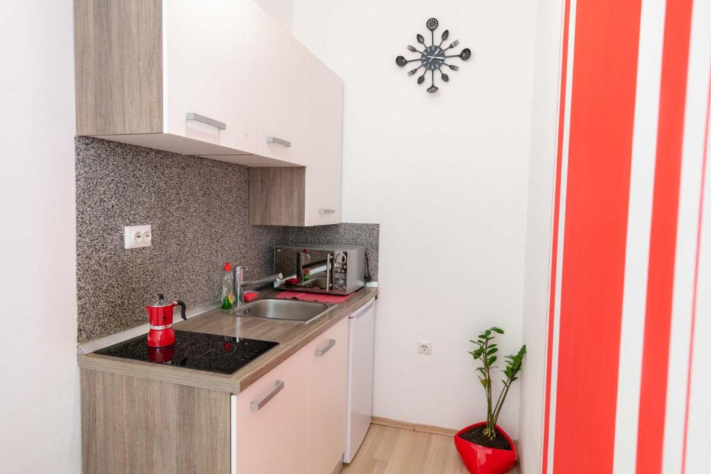Kuchyňa alebo kuchynka v ubytovaní Apartments Trend