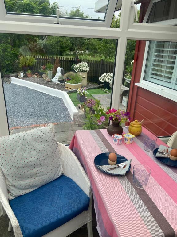 a table with a table cloth and eggs on it at Barrow Harbour studio apartment in Tralee
