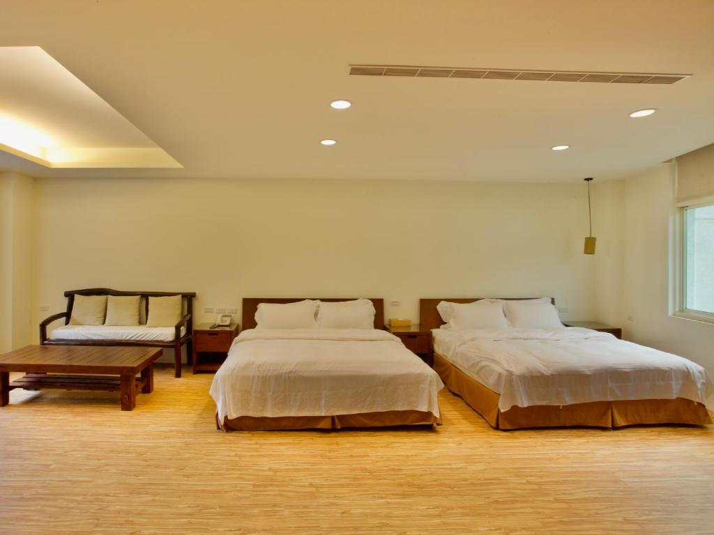 Postel nebo postele na pokoji v ubytování Spring Spa Hotel