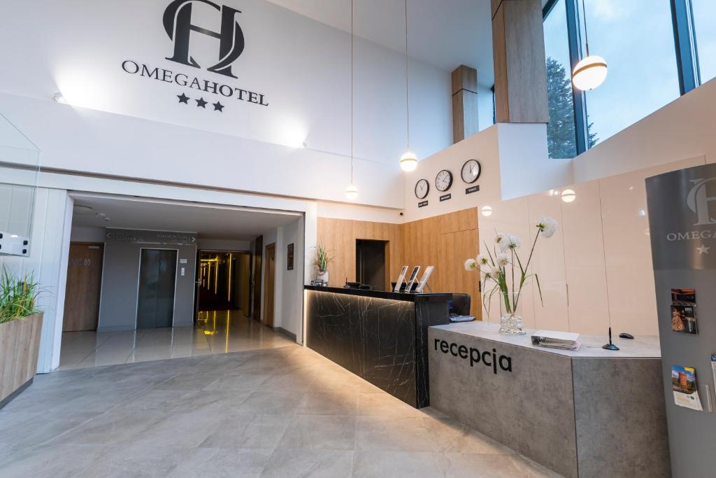 Vstupní hala nebo recepce v ubytování Omega Hotel