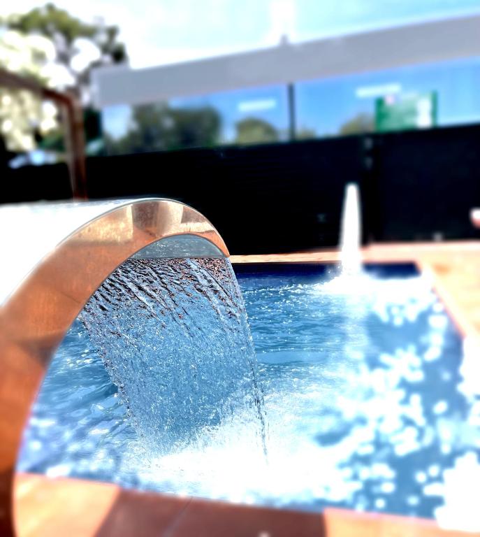 Bazén v ubytování Aparthotel SunClub Salou nebo v jeho okolí