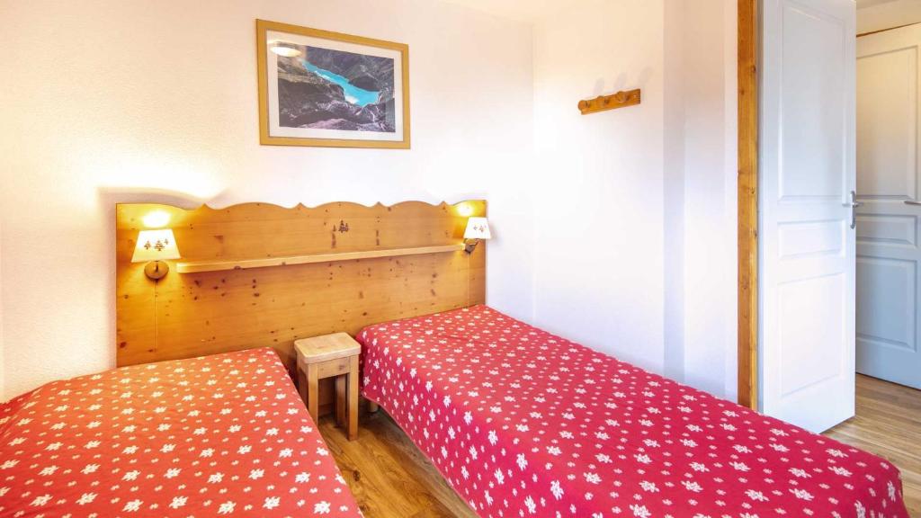 Postel nebo postele na pokoji v ubytování V du Bachat Asters B21 - Appt 6 pers