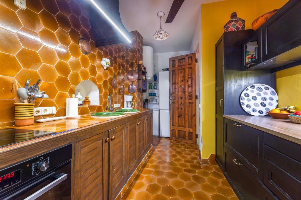 A kitchen or kitchenette at El Palomar