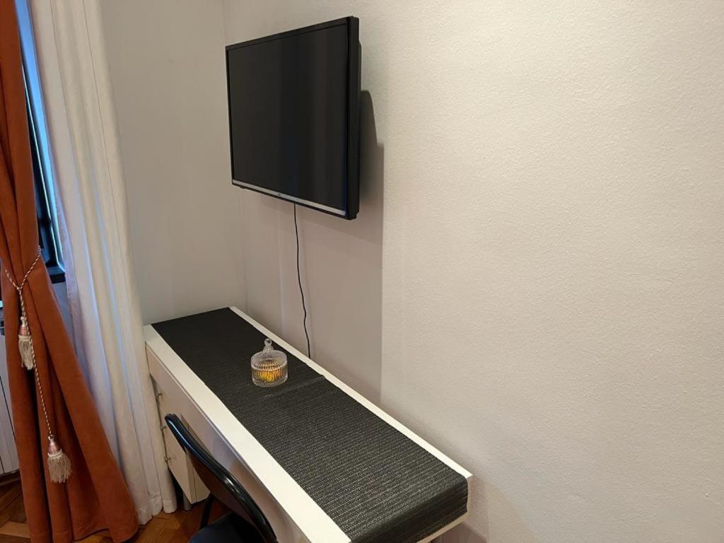 TV a/nebo společenská místnost v ubytování Rooms Aida