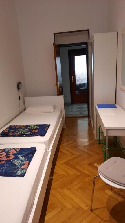 Postel nebo postele na pokoji v ubytování Rooms Aida