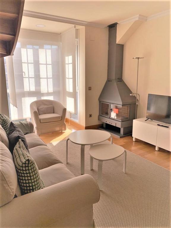 Posedenie v ubytovaní Apartamentos Del Pisuerga