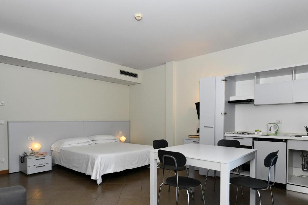 Postel nebo postele na pokoji v ubytování Hotel Eden