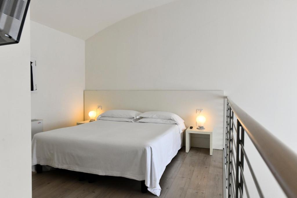 Postel nebo postele na pokoji v ubytování Hotel Eden