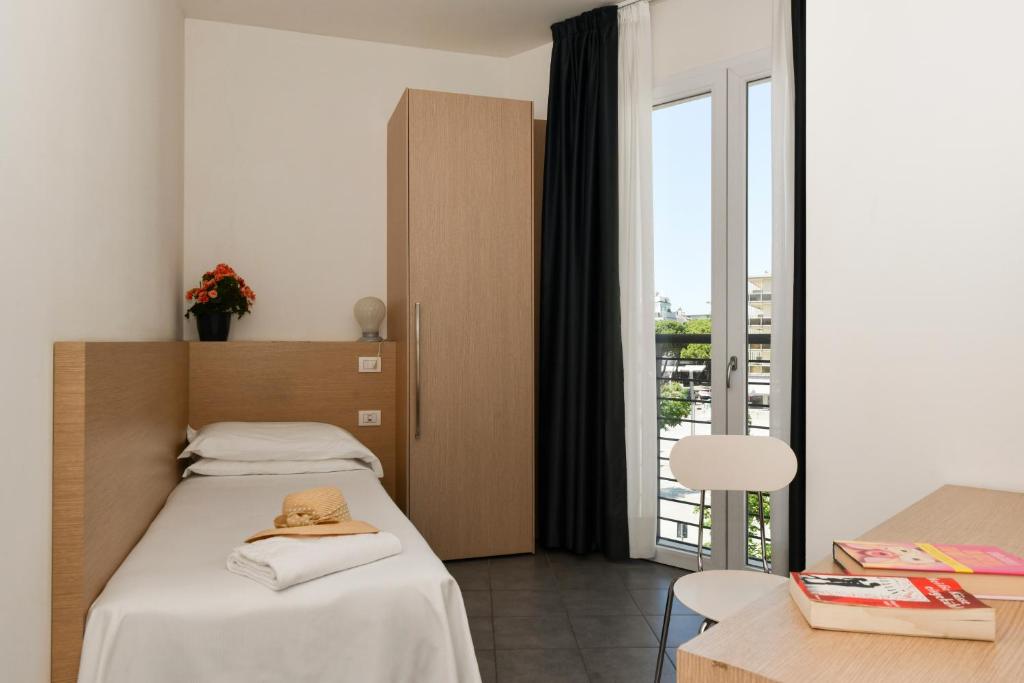 Postel nebo postele na pokoji v ubytování Hotel Eden