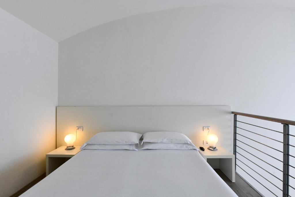 Postel nebo postele na pokoji v ubytování Hotel Eden