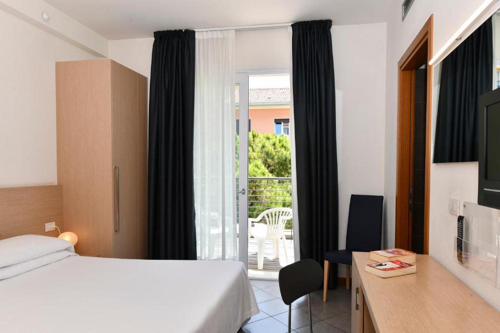 Postel nebo postele na pokoji v ubytování Hotel Eden
