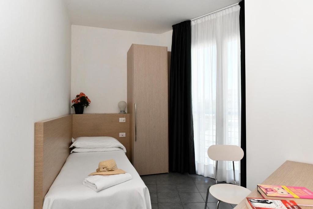 Postel nebo postele na pokoji v ubytování Hotel Eden