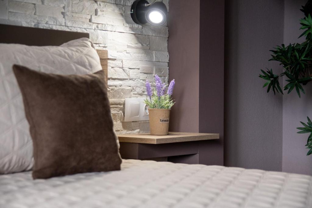 Postel nebo postele na pokoji v ubytování Studios Diogenis