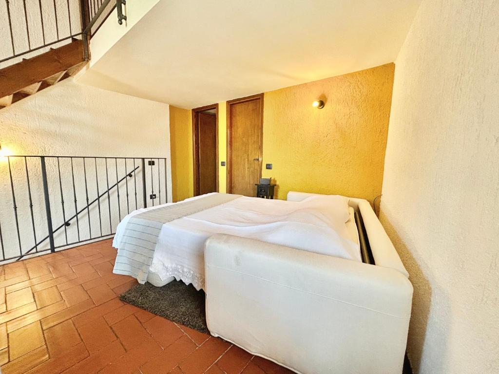 Postel nebo postele na pokoji v ubytování Chalet Garda