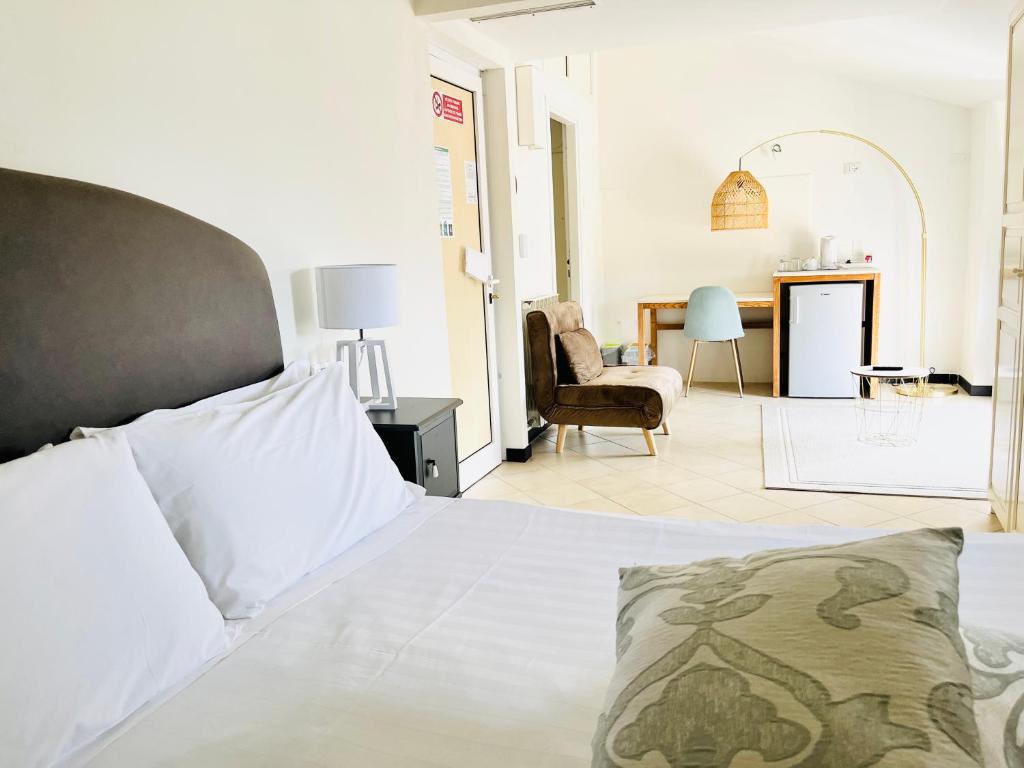 Łóżko lub łóżka w pokoju w obiekcie Villa Giada Resort