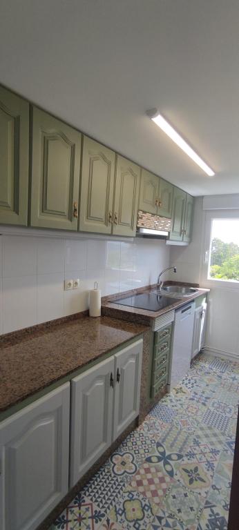 Kuchyň nebo kuchyňský kout v ubytování Casa Iris - Paraíso Ortegal