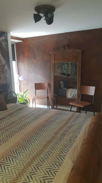 Postel nebo postele na pokoji v ubytování La Jo Welcome Home