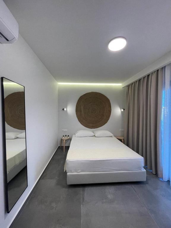 Postel nebo postele na pokoji v ubytování Delight Suites