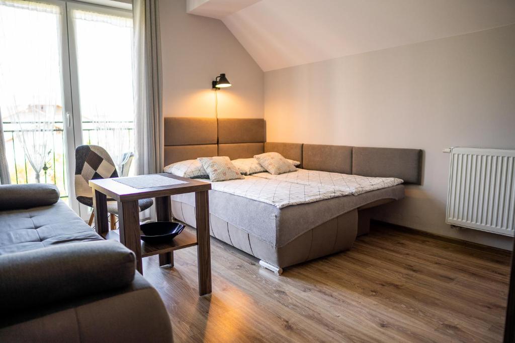 Postel nebo postele na pokoji v ubytování Pokoje Gościnne KLIMAT w Chłapowie