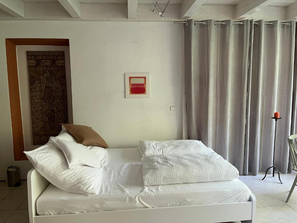 Postel nebo postele na pokoji v ubytování Haus am Schloss