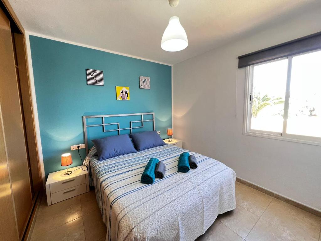Postel nebo postele na pokoji v ubytování Oasis Bay