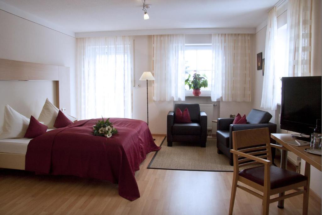 TV a/nebo společenská místnost v ubytování Hotel Linner
