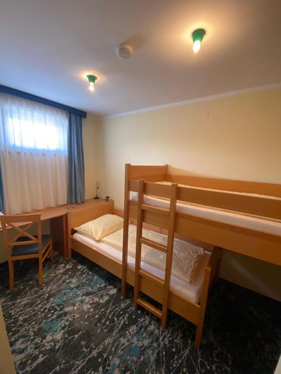 Postel nebo postele na pokoji v ubytování Hotel Seewirt