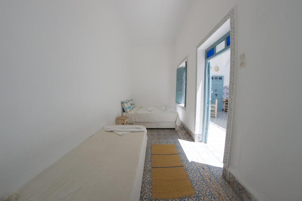 Postel nebo postele na pokoji v ubytování Hostel BE 20
