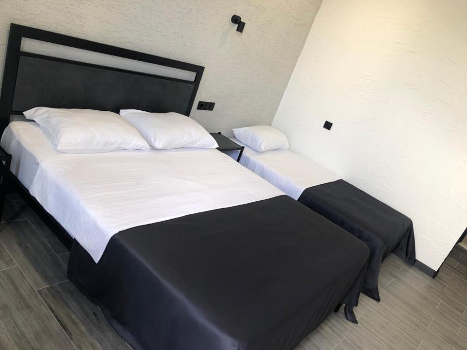 Postel nebo postele na pokoji v ubytování Hotel West Way