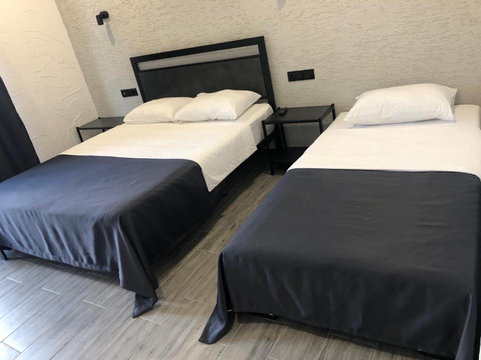 Postel nebo postele na pokoji v ubytování Hotel West Way
