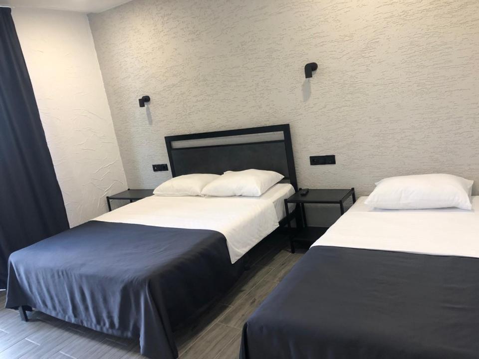 Postel nebo postele na pokoji v ubytování Hotel West Way