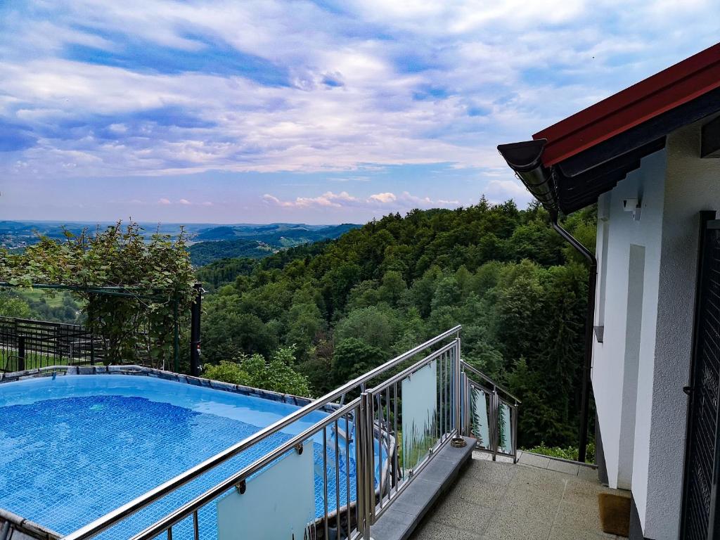 a swimming pool on the balcony of a house at Wellness pod zvezdami, Maribor - PRIVATE in Maribor