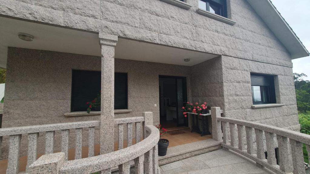 A balcony or terrace at A Cachada de Dorrón