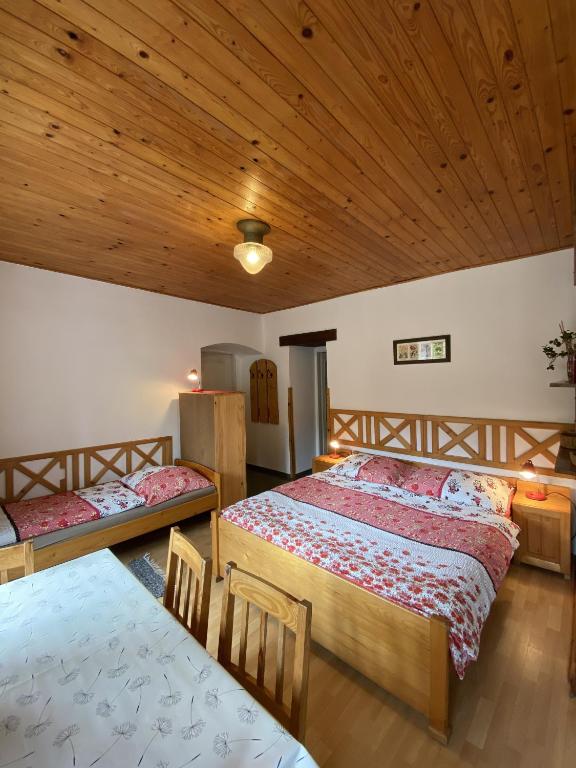 Postel nebo postele na pokoji v ubytování Pension Hamry