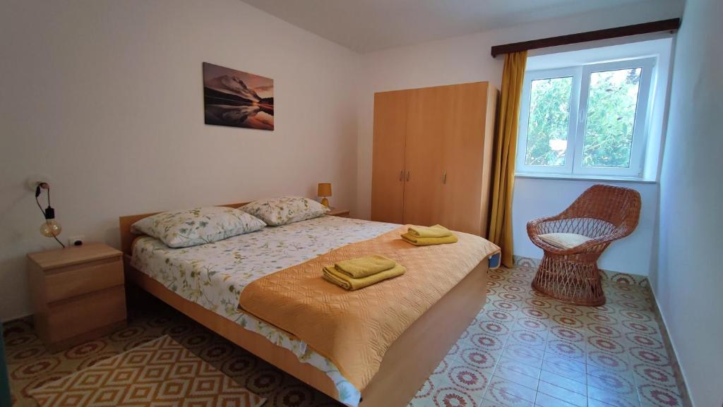 Postel nebo postele na pokoji v ubytování Villa John