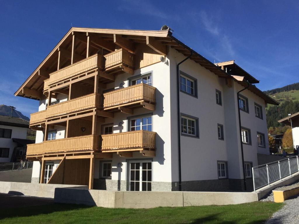 a building with balconies on the side of it at Modern Apartment near Ski Area in Brixen im Thale in Feuring