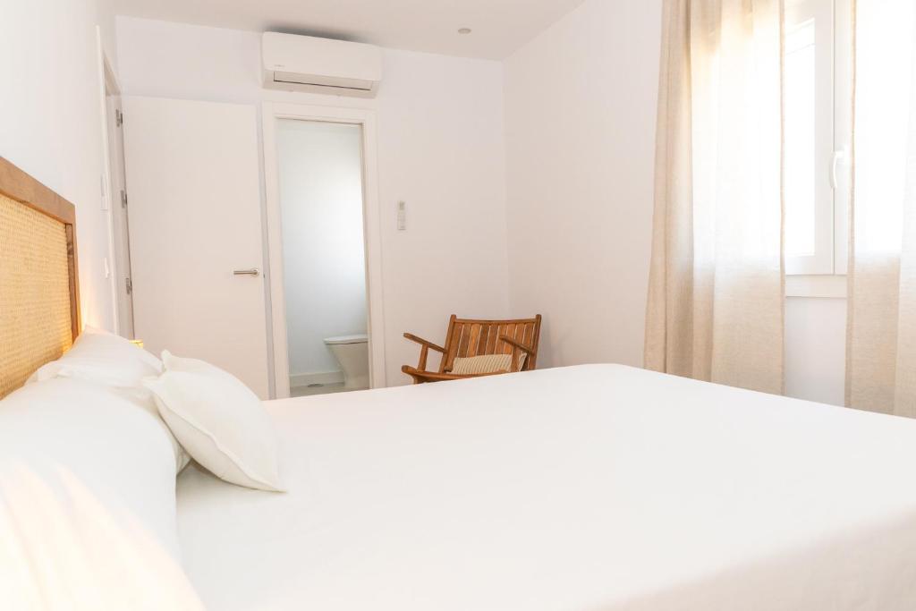 Posteľ alebo postele v izbe v ubytovaní Casa Los Lances Deluxe - Reformado Junto a la Playa y Terraza