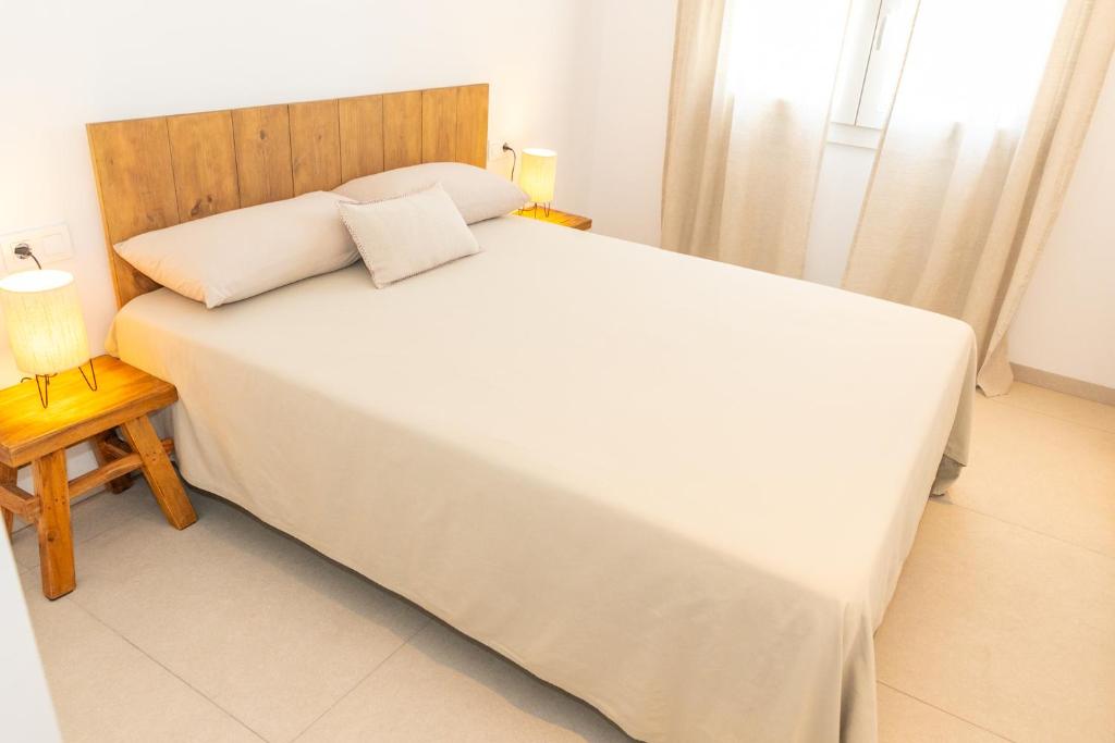 Posteľ alebo postele v izbe v ubytovaní Casa Los Lances Deluxe - Reformado Junto a la Playa y Terraza