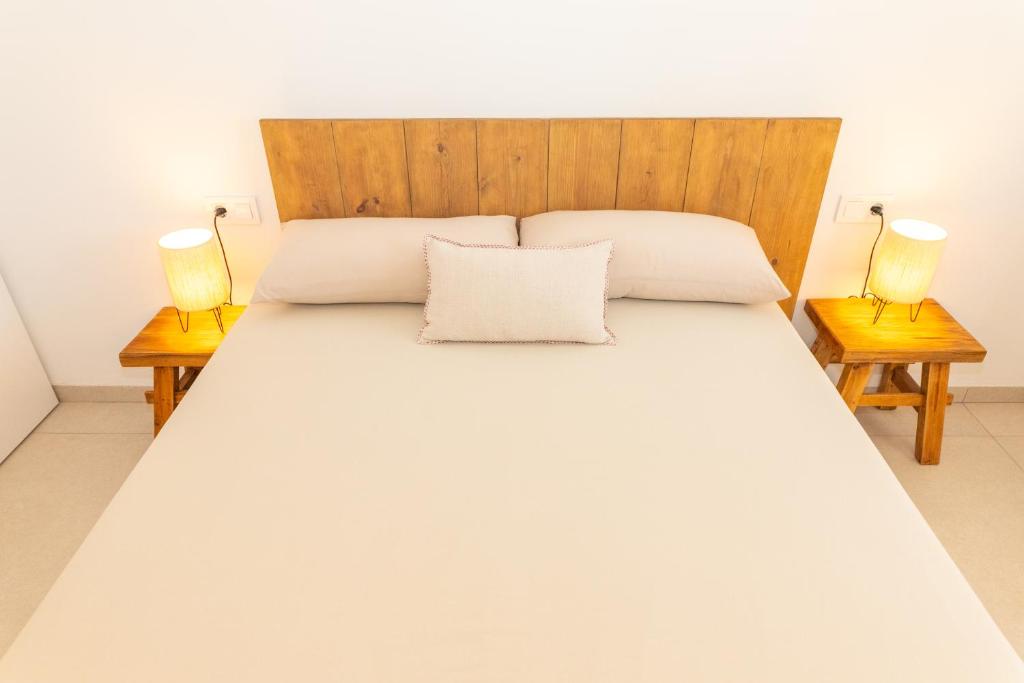 Posteľ alebo postele v izbe v ubytovaní Casa Los Lances Deluxe - Reformado Junto a la Playa y Terraza