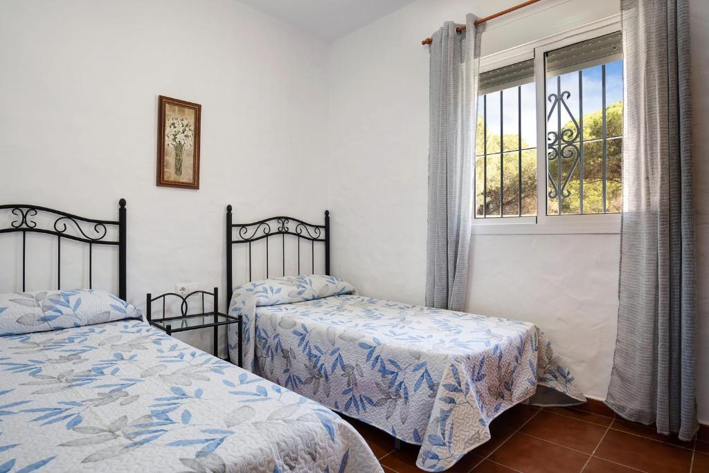 Posteľ alebo postele v izbe v ubytovaní Casa Paqui 3