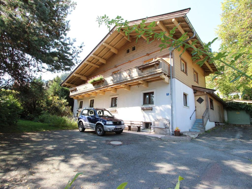 ein vor einem Haus geparkt in der Unterkunft Modern Apartment in Kitzbuhel near Ski Area in Kitzbühel