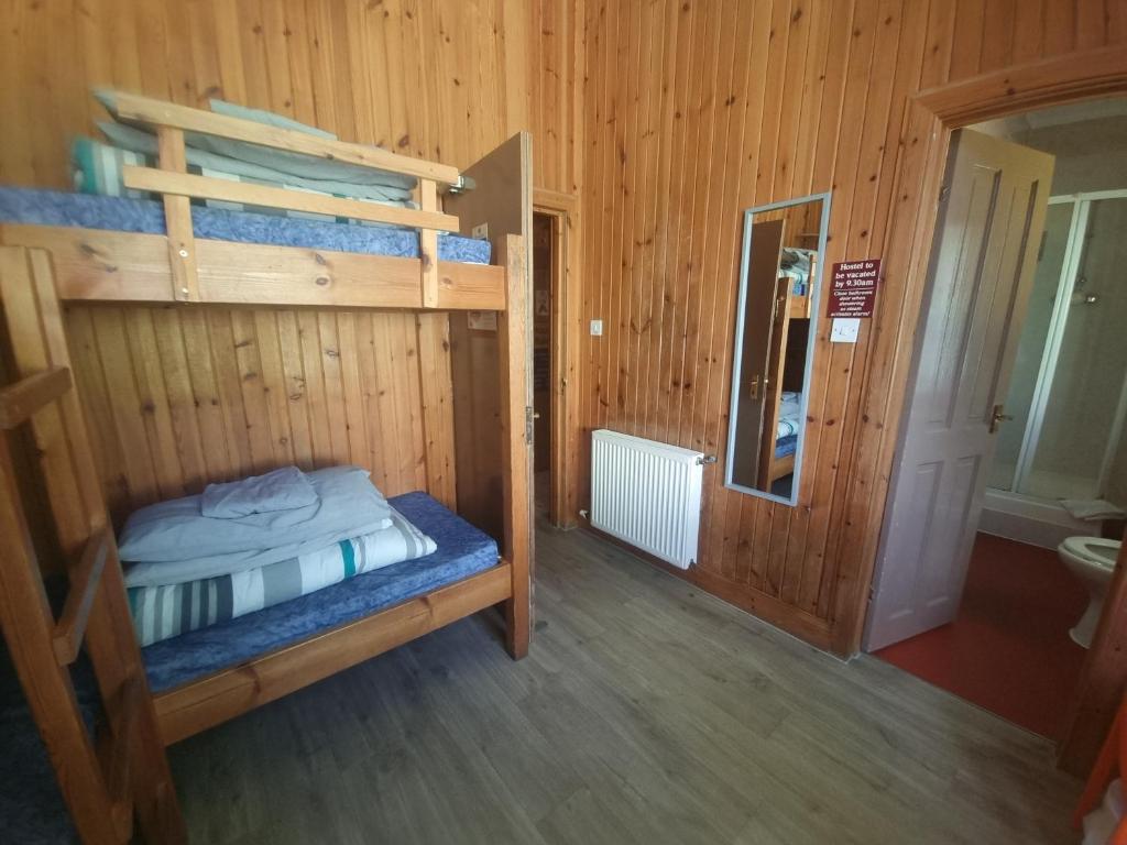 Postel nebo postele na pokoji v ubytování Blackwater Hostel