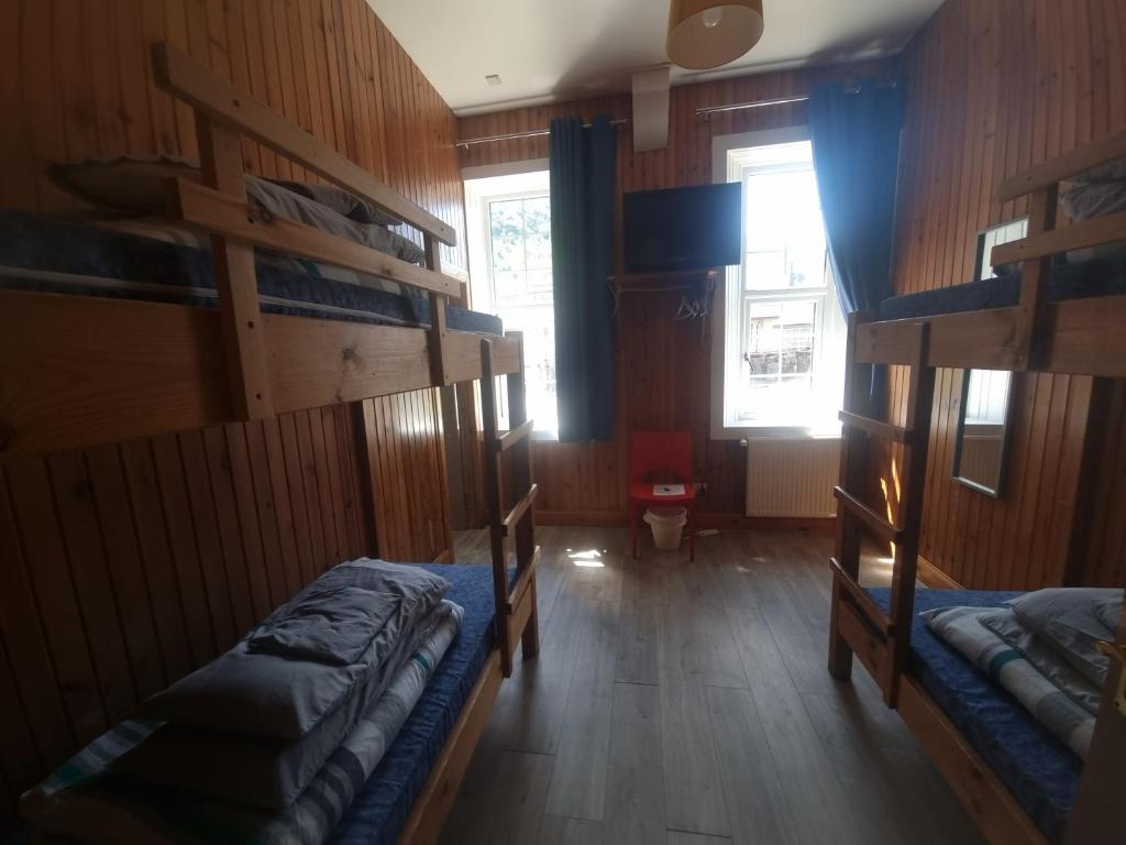 Postel nebo postele na pokoji v ubytování Blackwater Hostel